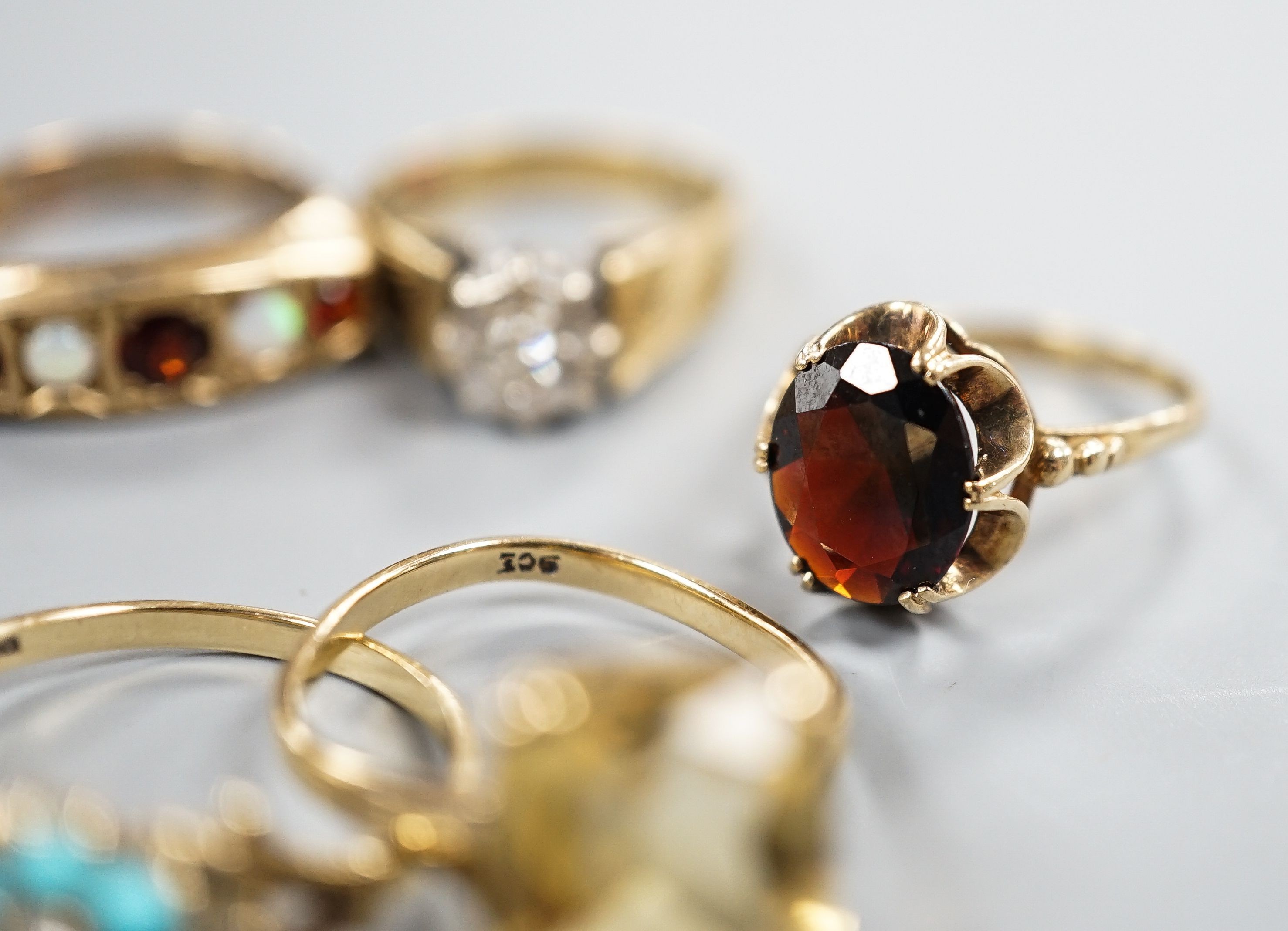Nine assorted mainly modern 9ct and gem set dress rings, gross weight 29.9 grams.